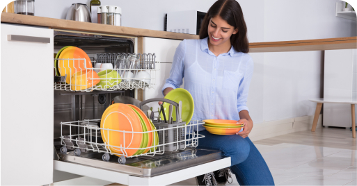 Professional cleaner tidying up an Airbnb kitchen